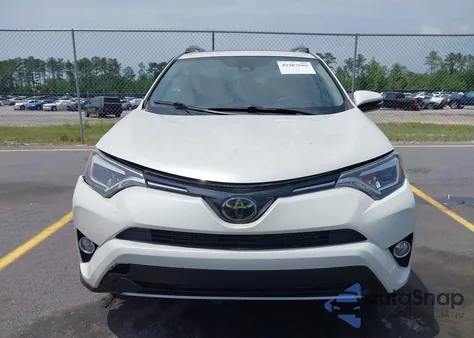 2018 Toyota Rav4 Limited from USA, damaged, VIN JTMYFREV3JJ170228